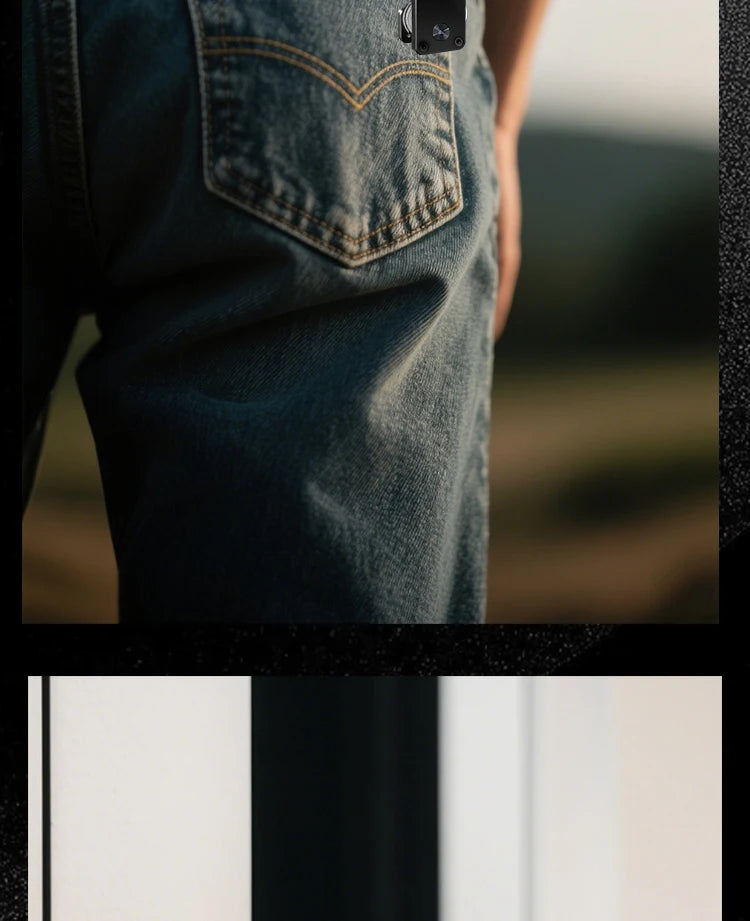 Close-up of a jeans back pocket with a small dark clip visible near the belt loop, next to a partially visible door-frame photo below